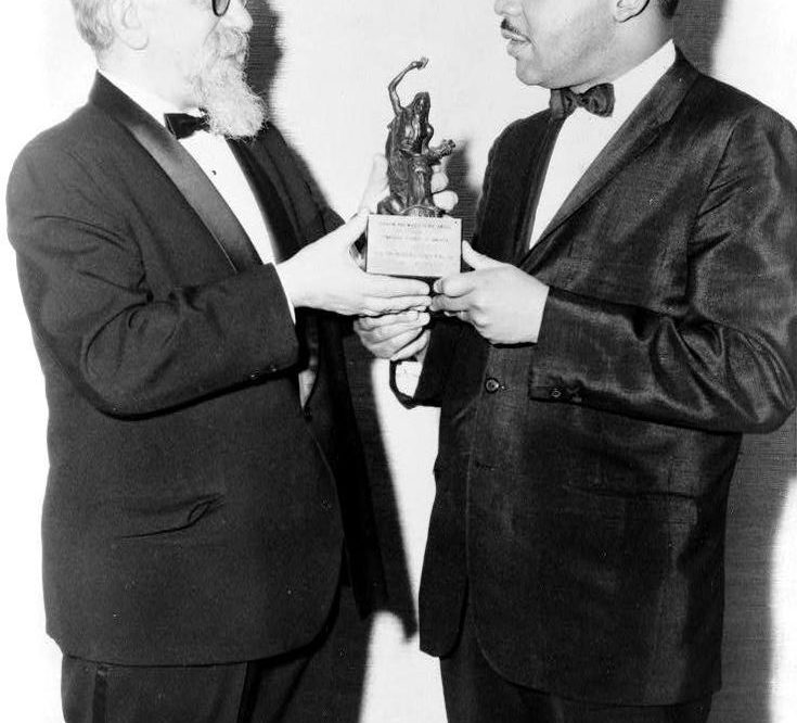 Rabbi Abraham Joshua Heschel, left, presenting the Rev. Martin Luther King Jr. with the Judaism and World Peace Award, December 1965. (Library of Congress)