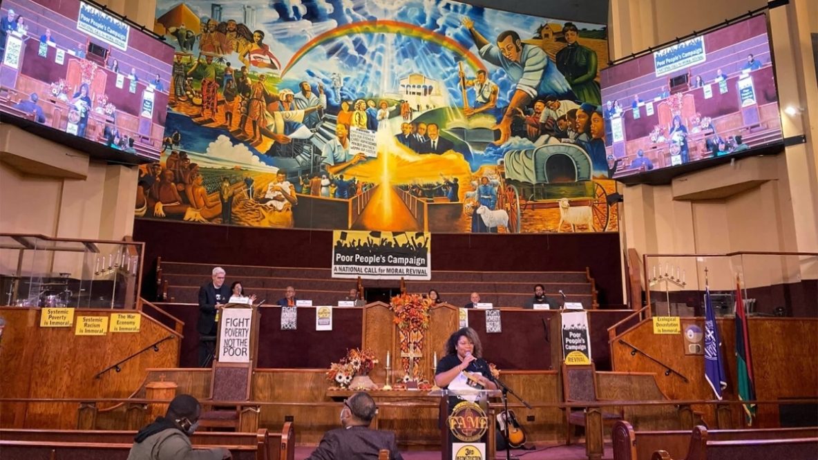 Colleen Thomas, bottom center at podium, speaks during the “Constructing a Moral Narrative: Dismantling Christian Nationalism” panel at First African Methodist Episcopal Church in Los Angeles. RNS photo by Alejandra Molina